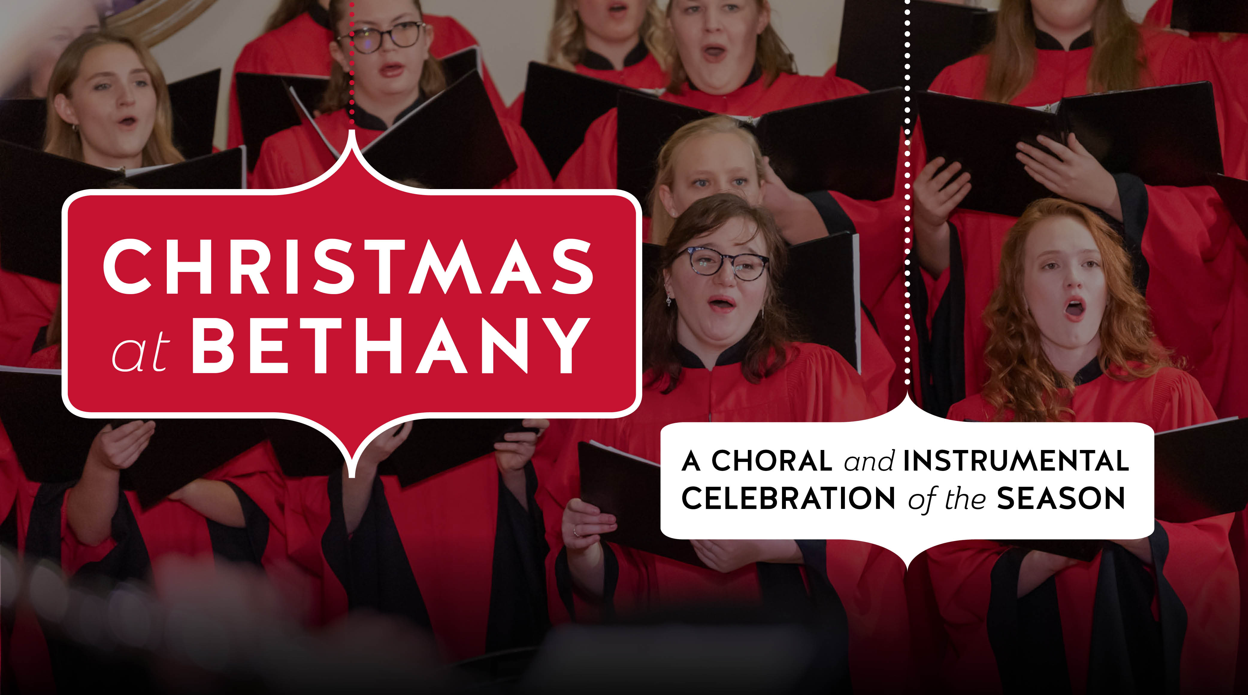 A choir in red robes sings during Christmas at Bethany: A Choral and Instrumental Celebration of the Season at Bethany Lutheran College.