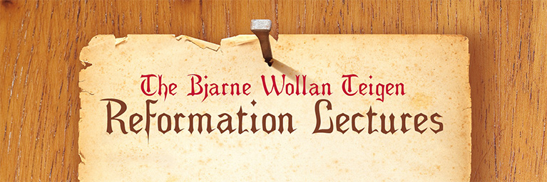A nail secures a piece of paper to a wooden surface. The paper reads, “The Bjarne Wollan Teigen Reformation Lectures for the campus community.”.