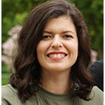 Hannah Anderson, Adjunct Faculty for the English Department, smiles outdoors on the Bethany Lutheran College campus.