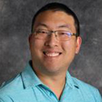 Michael Harting, Information Technology Specialist and Help Desk Support for the Information Technology Services Department against grey background.