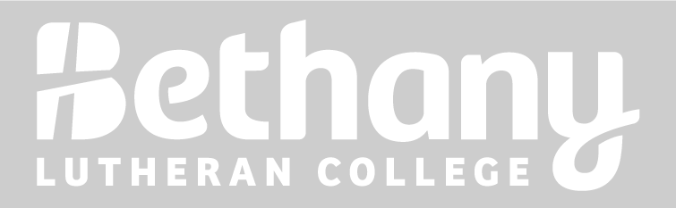 Bethany Lutheran College logo with white text on a gray background, representing Mankato, Minnesota.