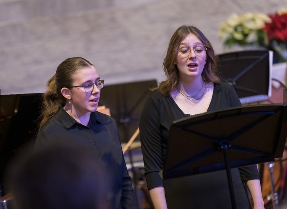 two-female-vocalists-perform-in-cconcert-setting